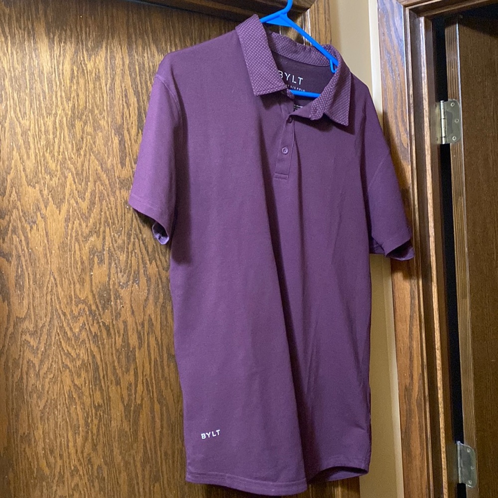 Maroon BYLT polo, micro grey dots on collar.